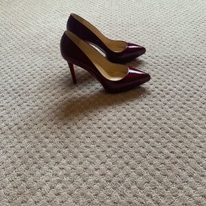 Louboutin patent leather pumps, size 38, dark red